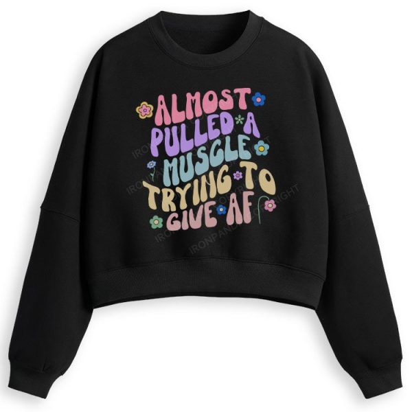 ALMOST PULLED A MUSCLE TRYING TO GIVE AF Fleece Crop Sweatshirt